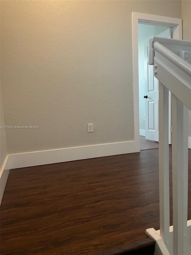 977 SW 153rd Path, Miami, FL 33194 - spare room with dark wood-style floors and baseboards