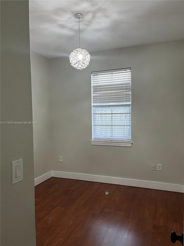 977 SW 153rd Path, Miami, FL 33194 - unfurnished room featuring baseboards and dark wood-style flooring