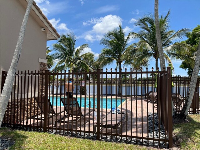 977 SW 153rd Path, Miami, FL 33194 - community pool with a patio