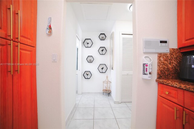 14426 NW 88th Ave, Miami Lakes, FL 33018 - corridor with light tile patterned flooring and baseboards