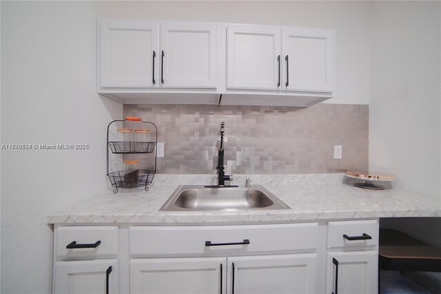14426 NW 88th Ave, Miami Lakes, FL 33018 - bar featuring a sink and tasteful backsplash