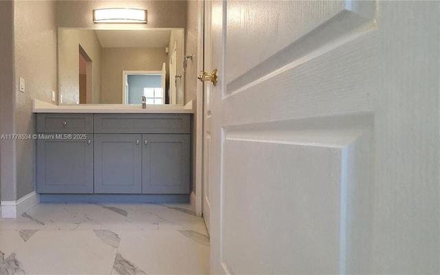 14426 NW 88th Ave, Miami Lakes, FL 33018 - bathroom with vanity, marble finish flooring, and baseboards