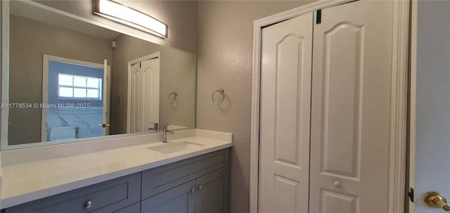 14426 NW 88th Ave, Miami Lakes, FL 33018 - bathroom with a textured wall and vanity