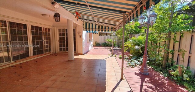 14426 NW 88th Ave, Miami Lakes, FL 33018 - fenced backyard featuring a patio area