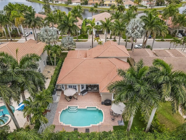 2269 Quail Roost Dr, Weston, FL 33327 - aerial view of residential area with a pool area and a nearby body of water