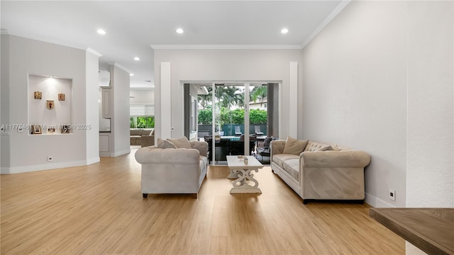 2269 Quail Roost Dr, Weston, FL 33327 - living area featuring light wood-style flooring, crown molding, recessed lighting, and baseboards