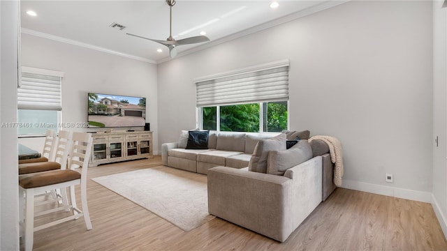 2269 Quail Roost Dr, Weston, FL 33327 - living area with ornamental molding, ceiling fan, baseboards, recessed lighting, and light wood finished floors
