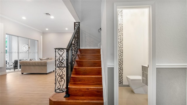 2269 Quail Roost Dr, Weston, FL 33327 - staircase featuring crown molding, baseboards, recessed lighting, and wood finished floors
