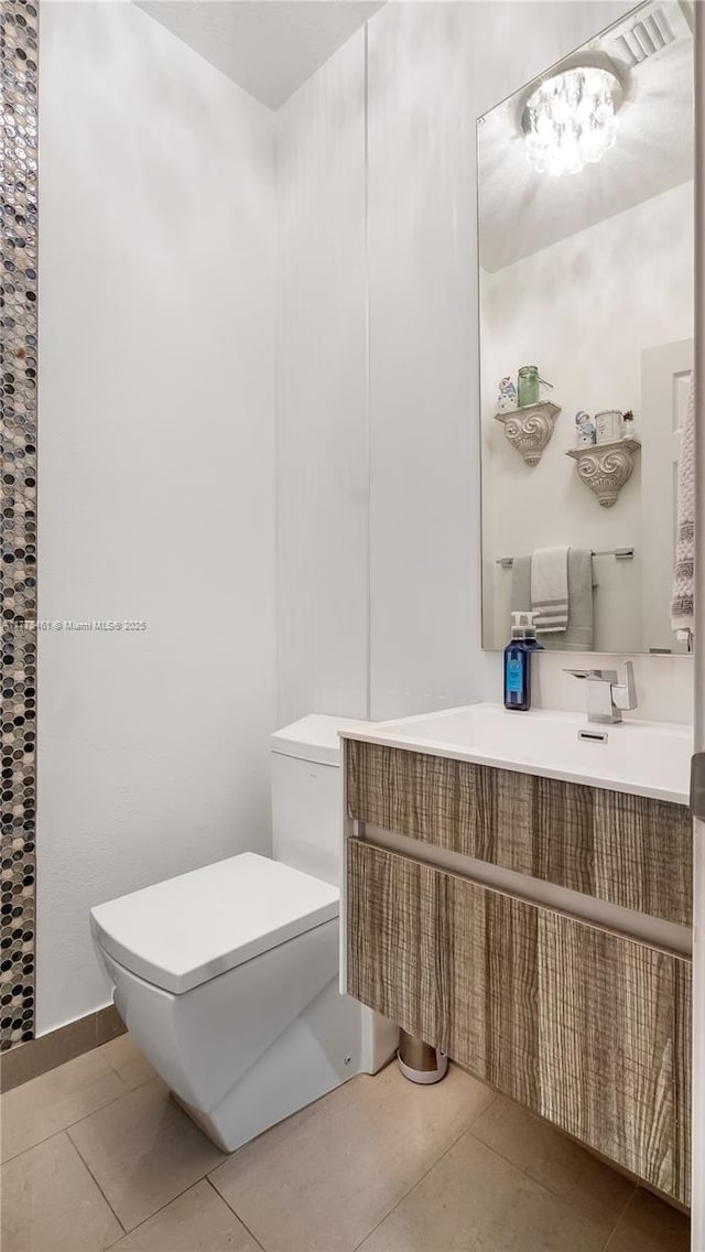 2269 Quail Roost Dr, Weston, FL 33327 - bathroom with toilet, tile patterned flooring, and vanity
