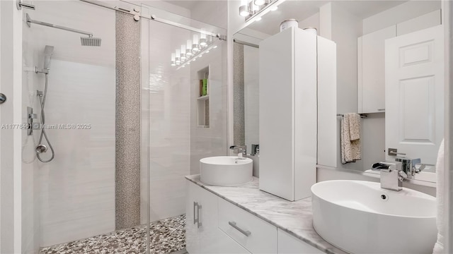 2269 Quail Roost Dr, Weston, FL 33327 - bathroom featuring a shower stall and double vanity