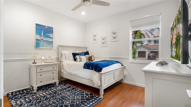 2269 Quail Roost Dr, Weston, FL 33327 - bedroom with light wood-style floors, baseboards, and a ceiling fan