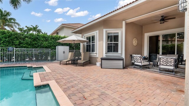 2269 Quail Roost Dr, Weston, FL 33327 - view of swimming pool featuring fence, a patio, and ceiling fan