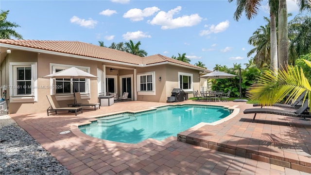 2269 Quail Roost Dr, Weston, FL 33327 - outdoor pool featuring a patio and area for grilling