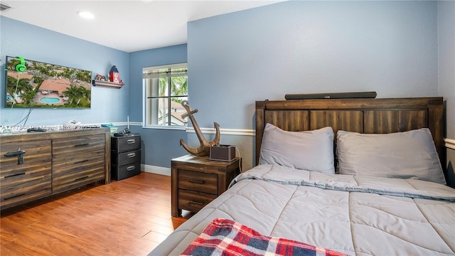 2269 Quail Roost Dr, Weston, FL 33327 - bedroom with wood finished floors and baseboards