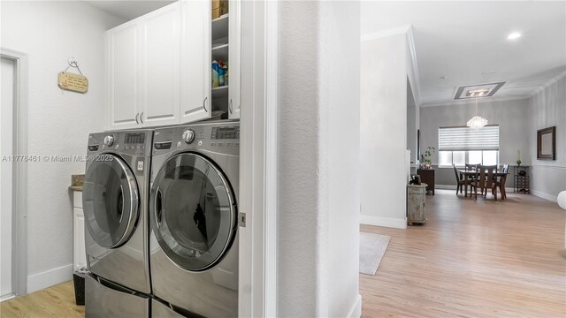 2269 Quail Roost Dr, Weston, FL 33327 - washroom with separate washer and dryer, ornamental molding, light wood-style floors, and baseboards