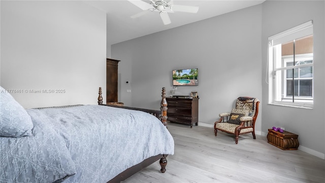2269 Quail Roost Dr, Weston, FL 33327 - bedroom with light wood-type flooring, baseboards, and a ceiling fan