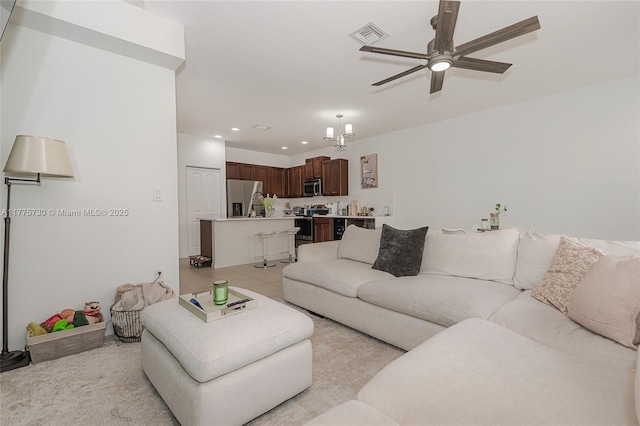 1091 NW 33rd Ct, Pompano Beach, FL 33064 - living room with a ceiling fan, visible vents, and recessed lighting