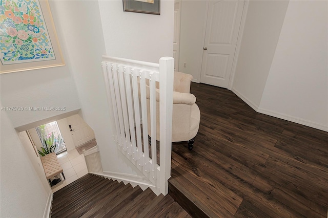 1091 NW 33rd Ct, Pompano Beach, FL 33064 - stairway with wood finished floors and baseboards