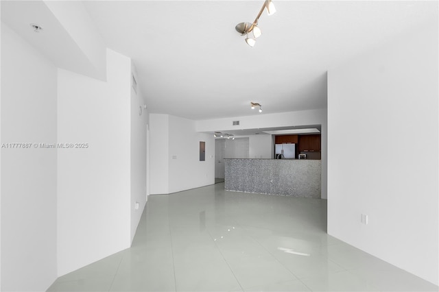 16699 Collins Ave Unit 1610, Sunny Isles Beach, FL 33160 - unfurnished living room with tile patterned flooring