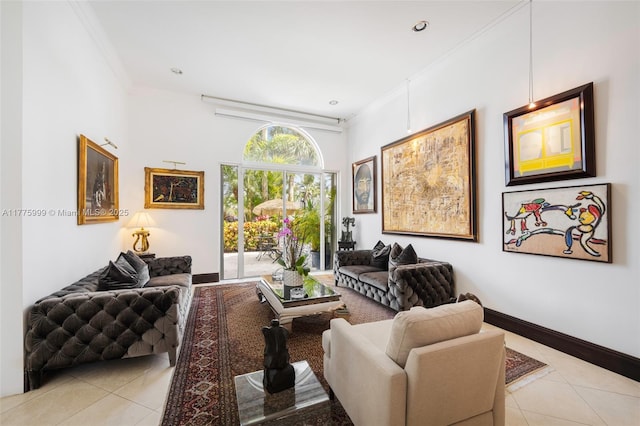 sitting room featuring baseboards, tile patterned flooring, ornamental molding, and recessed lighting