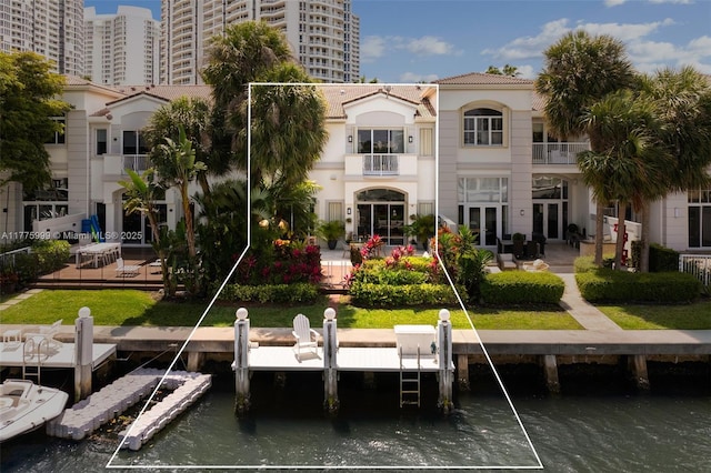 dock area with a water view