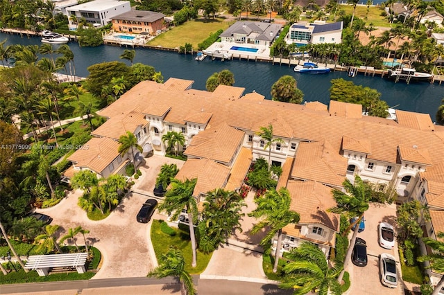 bird's eye view with a water view and a residential view