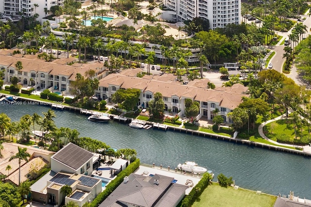 birds eye view of property featuring a residential view and a water view
