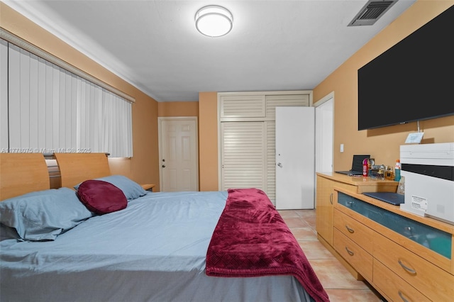 2447 SE 15th St, Pompano Beach, FL 33062 - bedroom with visible vents, a closet, and light tile patterned flooring