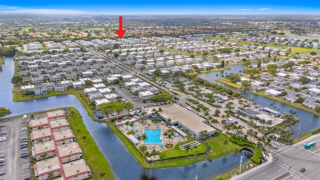 birds eye view of property featuring a water view