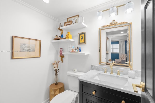 half bath featuring toilet, vanity, and crown molding