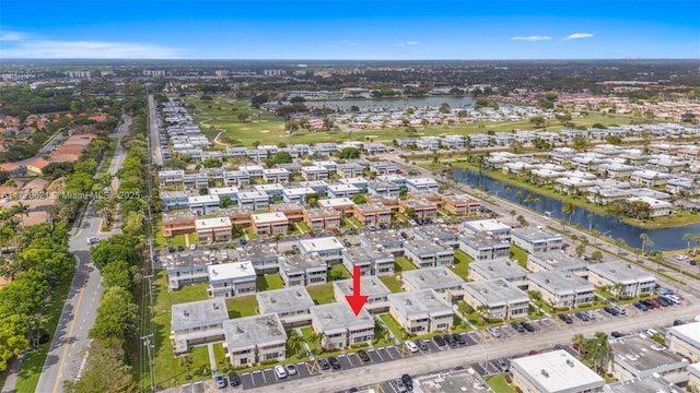aerial view with a residential view and a water view