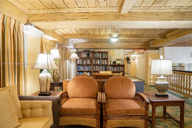 living area with beam ceiling and wooden ceiling