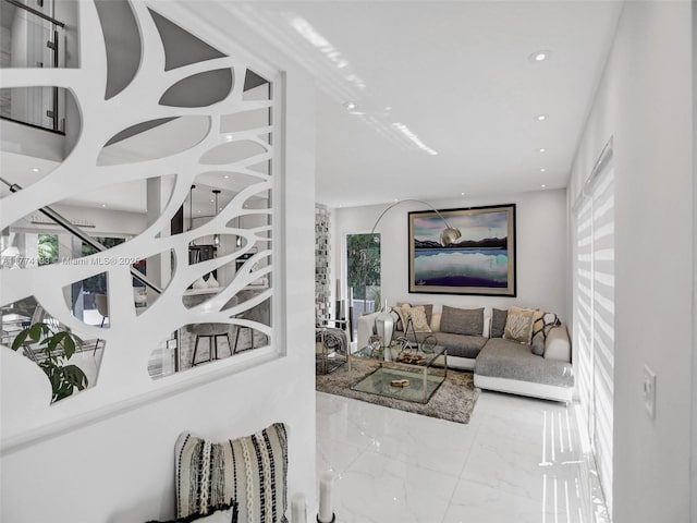 1273 NE 92nd St, Miami Shores, FL 33138 - living room with marble finish floors, healthy amount of natural light, and recessed lighting