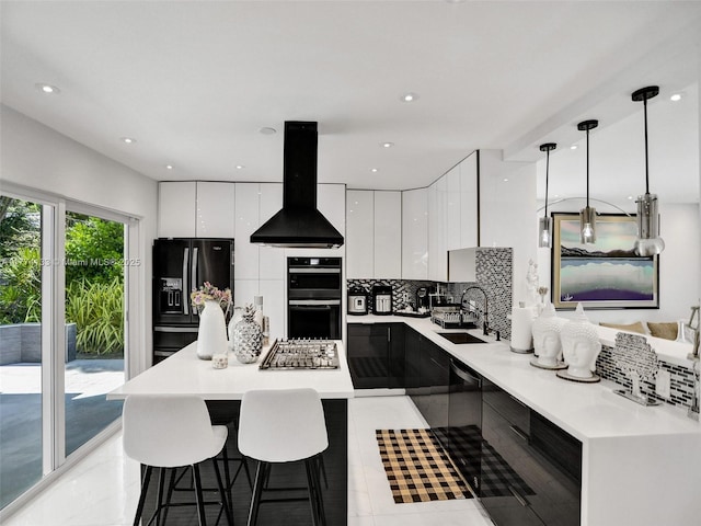 1273 NE 92nd St, Miami Shores, FL 33138 - kitchen with modern cabinets, a sink, stainless steel appliances, wall chimney exhaust hood, and recessed lighting