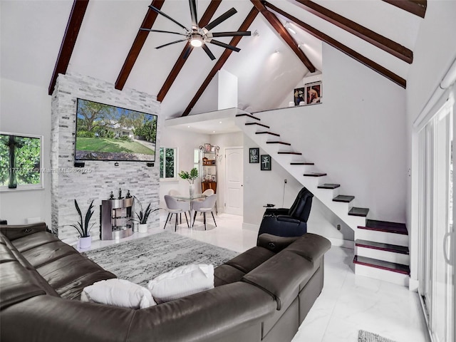 1273 NE 92nd St, Miami Shores, FL 33138 - living area with high vaulted ceiling, ceiling fan, stairway, beam ceiling, and marble finish flooring