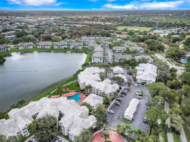 aerial view featuring a residential view and a water view