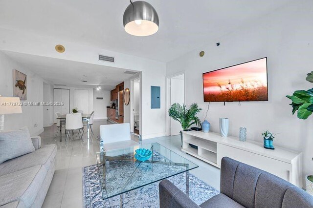 485 SE Brickell Ave Unit 1711, Miami, FL 33131 - dining area with light tile patterned flooring and rail lighting