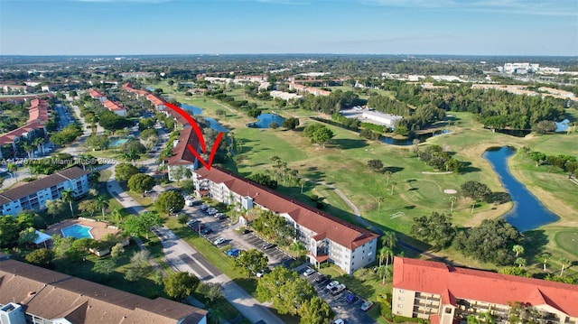 12701 SW 13th St Unit 301F, Pembroke Pines, FL 33027 - bird's eye view with golf course view, a residential view, and a water view