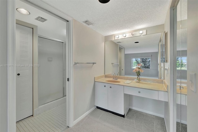 12701 SW 13th St Unit 301F, Pembroke Pines, FL 33027 - full bath featuring vanity, a closet, baseboards, a stall shower, and visible vents
