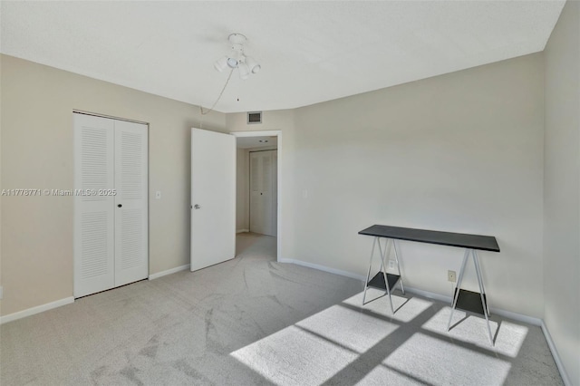 12701 SW 13th St Unit 301F, Pembroke Pines, FL 33027 - unfurnished bedroom with carpet floors, baseboards, a closet, and visible vents