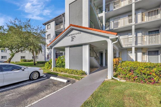 12701 SW 13th St Unit 301F, Pembroke Pines, FL 33027 - view of property with uncovered parking