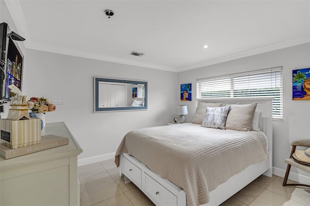 bedroom with crown molding, light tile patterned flooring, baseboards, and visible vents