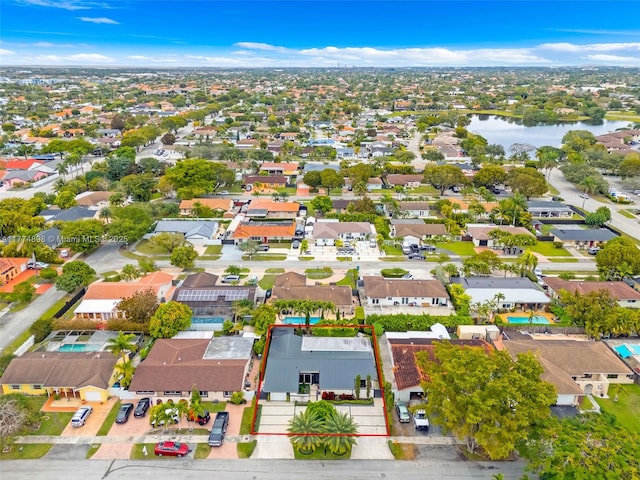 aerial view with a water view and a residential view