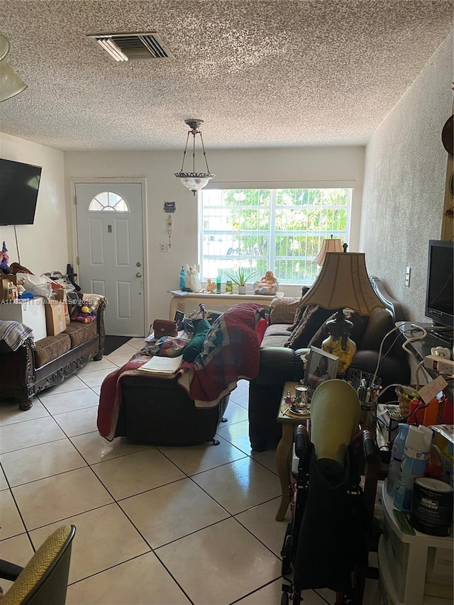 10041 SW 14th Ter, Miami, FL 33174 - living room featuring light tile patterned flooring and a textured ceiling