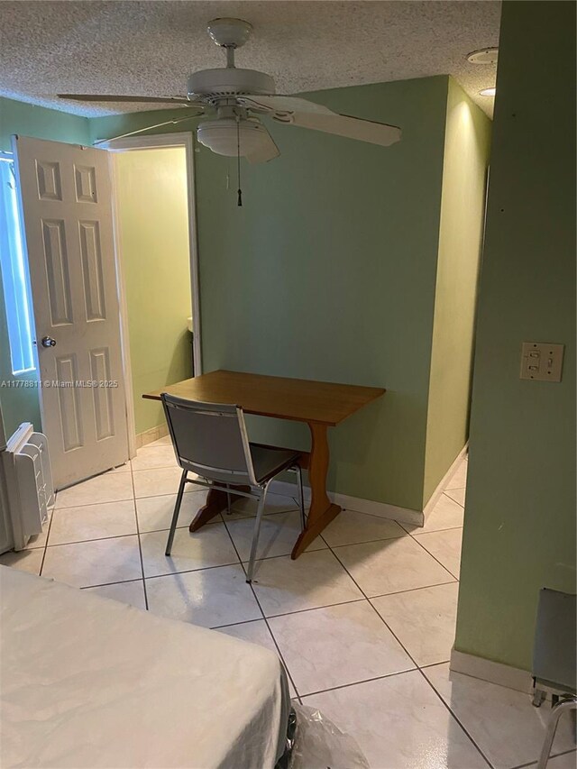 10041 SW 14th Ter, Miami, FL 33174 - dining area with ceiling fan, light tile patterned flooring, and a textured ceiling