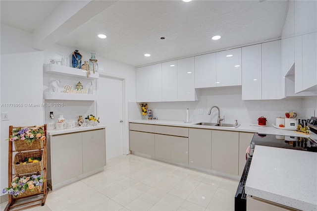 10610 SW 203rd Ter, Cutler Bay, FL 33189 - kitchen featuring recessed lighting, open shelves, white cabinets, and a sink