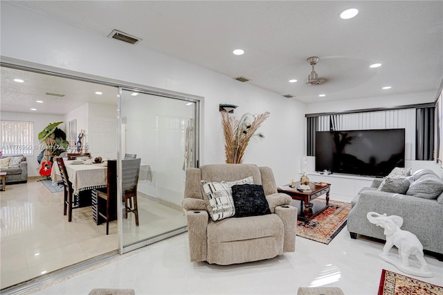 10610 SW 203rd Ter, Cutler Bay, FL 33189 - living area with light tile patterned floors, visible vents, and recessed lighting