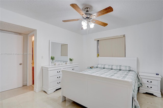 10610 SW 203rd Ter, Cutler Bay, FL 33189 - bedroom featuring ceiling fan and a textured ceiling