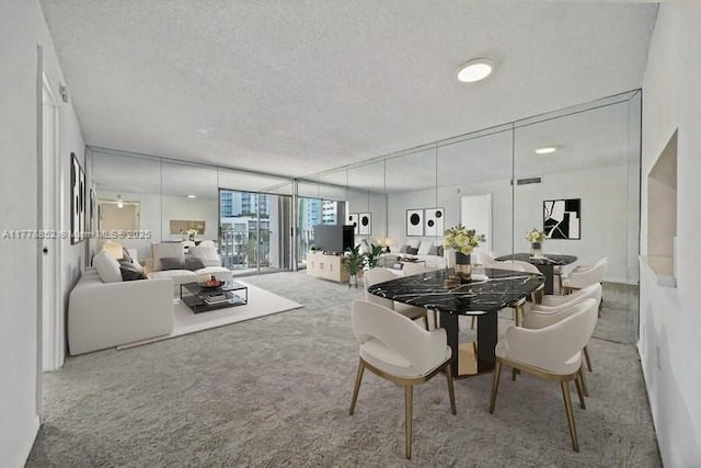 6545 Indian Creek Dr Unit 505, Miami Beach, FL 33141 - dining room with carpet flooring and a textured ceiling