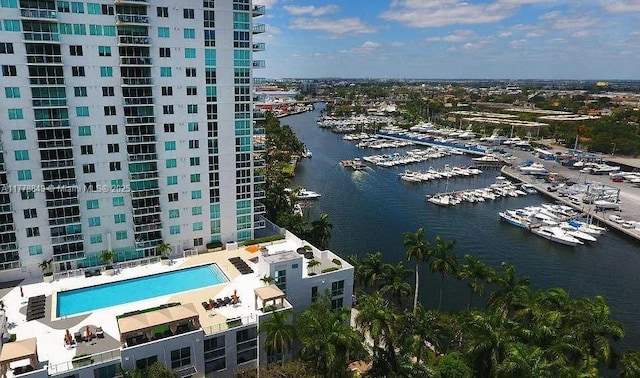 birds eye view of property featuring a water view